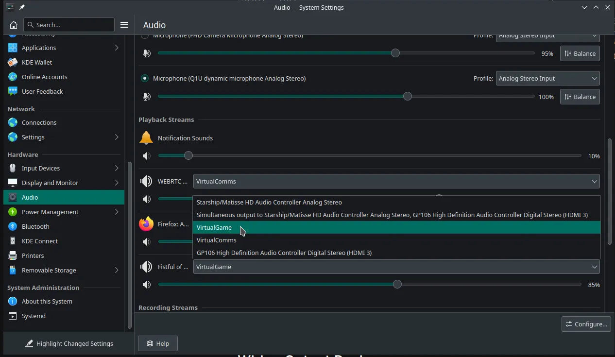 The KDE Audio Settings. You can see, that you can choose the output device on a per-application basis.